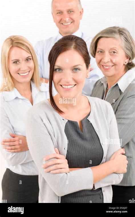 Business Team Young Woman With Mature Colleagues Stock Photo Alamy