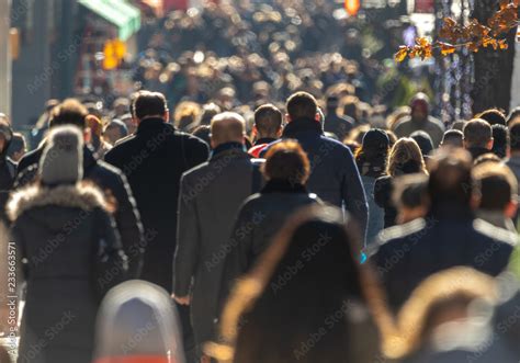 Crowd of people walking street Stock Photo | Adobe Stock