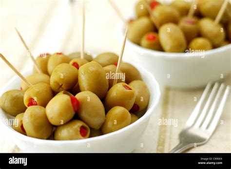 Green Olives Stuffed With Red Peppers Stock Photo Alamy