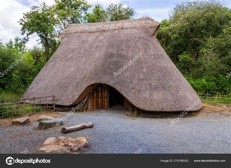 Old Thatch Cottage With Camp Fire Concept Of Early Age Human