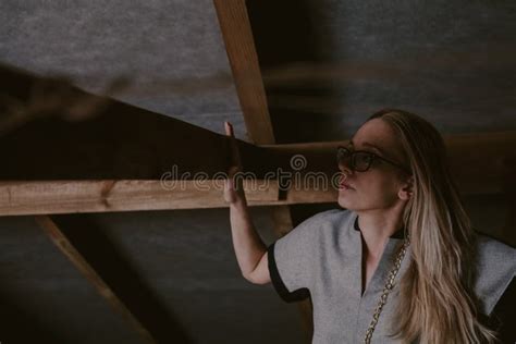 Beautiful Blonde In Glasses Stands In Attic Stock Image Image Of Board Floor