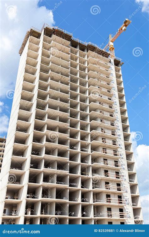 Tall Apartment Buildings Under Construction With Cranes Against