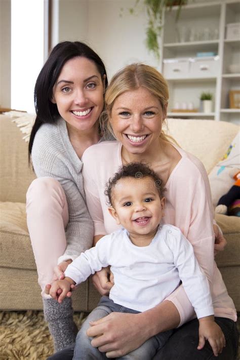 Same Sex Couple With Baby Son Stock Image Image Of Beauty Cuddle
