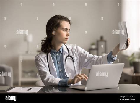 internist holding  ray results review fractures  patient stock