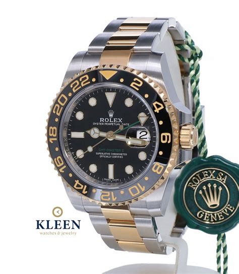 Rolex Oyster Perpetual GMT Master II Gold Steel Black Dial 40 Mm