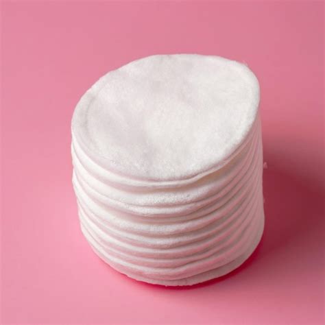 Premium Photo | Cosmetic cotton pads a stack of cotton pads on a ...