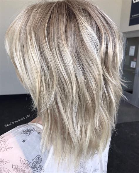 Two Layer Razored Blonde Hairstyle Modern Shag Haircut Medium Length Hair Cuts Long Hair Styles