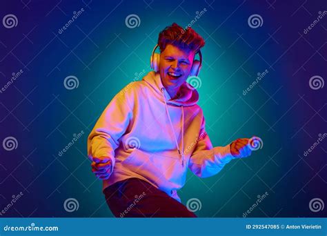 Portrait Of Attractive Young Guy Man Dressed White Hoodie Listening