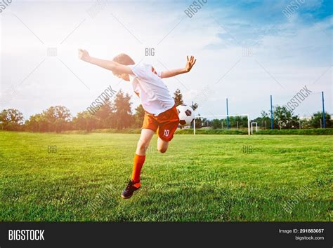 Boy Playing Football Image & Photo (Free Trial) | Bigstock