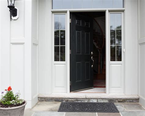 What does blowing cinnamon on your front door do?