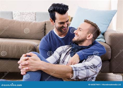Gay Couple Hugging On The Couch Stock Image Image Of Enjoying Leisure