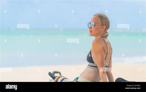 Blonde Woman Relaxing On Tropical Beach With Sunglasses In Bikini Stock Photo Alamy