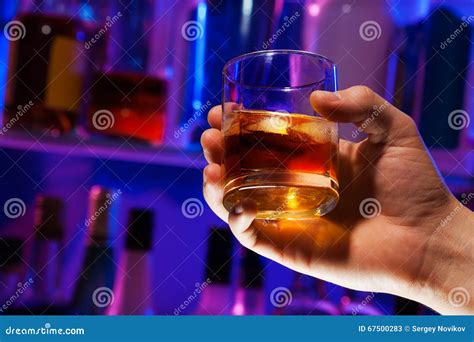 Man Hand With Whiskey Glass In Bar Stock Image Image Of Brandy