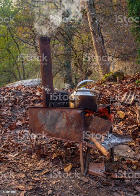 Kettles Are Boiled On A Wood Burning Stove Stock Photo Download Image