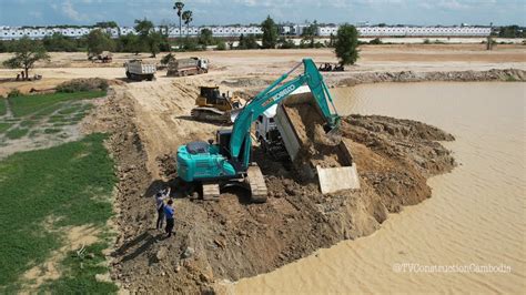 Incredible Stuck Shacman Dump Truck Unloading Dirt In Water Help