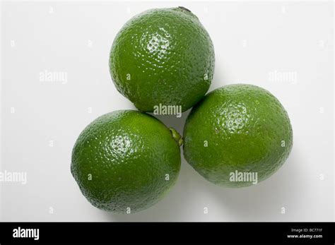 Three limes Stock Photo - Alamy