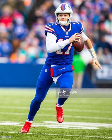 Josh Allen of the Buffalo Bills runs with the ball during the second ...