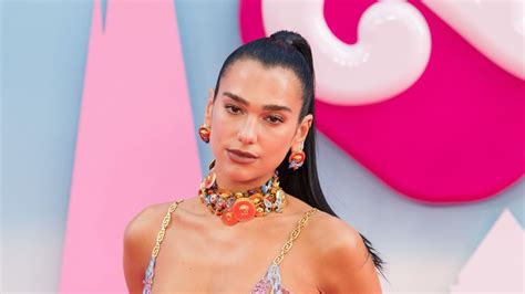 Dua Lipa Shows Us All How To Wear A Bikini As A Top This Fall Glamour