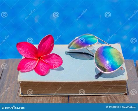 Book And Sunglasses Blue Water Background Stock Image Image Of Square Blue 91309095