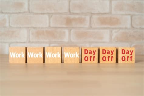 Premium Photo | Wooden blocks with work and day off text of concept.