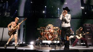The Naked Truth About Why Red Hot Chili Peppers Used To Wear Socks And Absolutely Nothing Else
