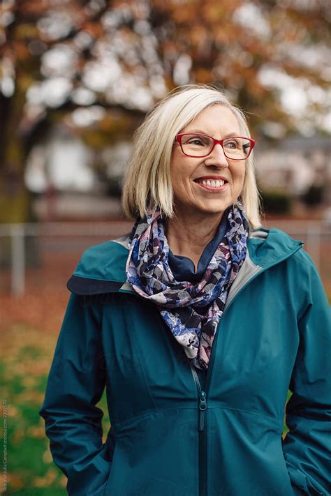 Smiling Mature Woman Outside By Stocksy Contributor Rob And Julia Campbell Stocksy