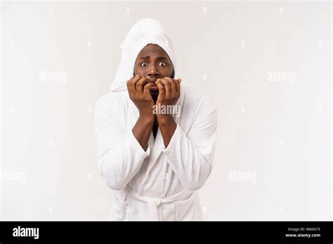 Portrait Of Excited Young African American Male Screaming In Shock And