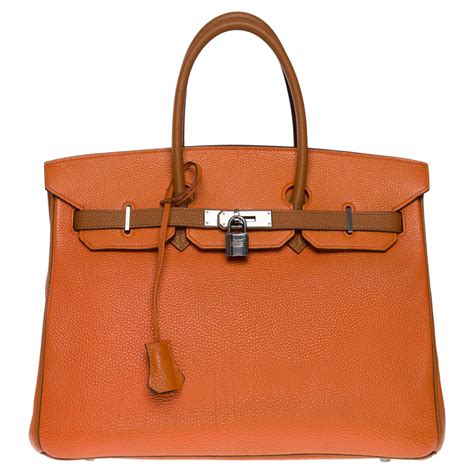 Stunning And Rare Bicolor Herm S Birkin Handbag In Orange And Camel