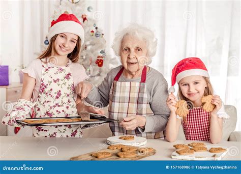 Grandmother With Granddaughters Baking Cookies Stock Photo Image Of