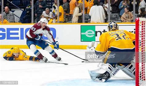 Matt Nieto Of The Colorado Avalanche Is Tripped By Jake Livingstone