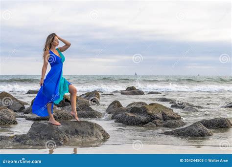 Lovely Brunette Latin Model Poses Outdoors On A Beach At Sunset Stock Image Image Of Casual