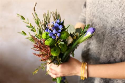 Premium Photo Woman Holding Bouquet Of Fresh Flowers