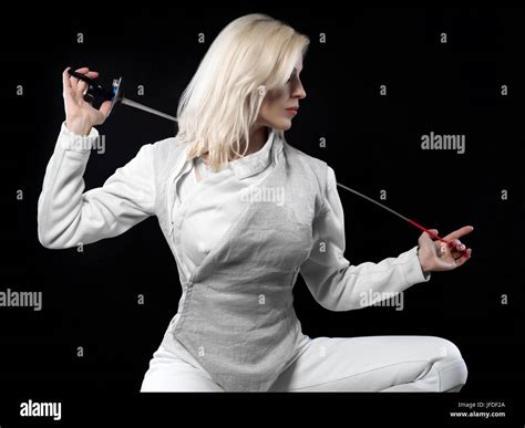 Portrait Of Beautiful Blonde Woman Fencer Holding Rapier Olympic