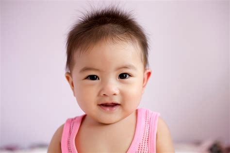 Premium Photo Happy Cute Babe On The Bed