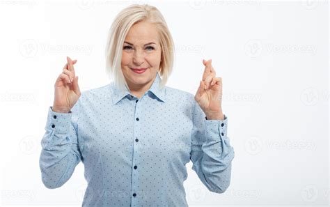 Half Length Portrait Of Beautiful Dreamy Blonde Wearing Blue Classic Blouse Standing Crossing