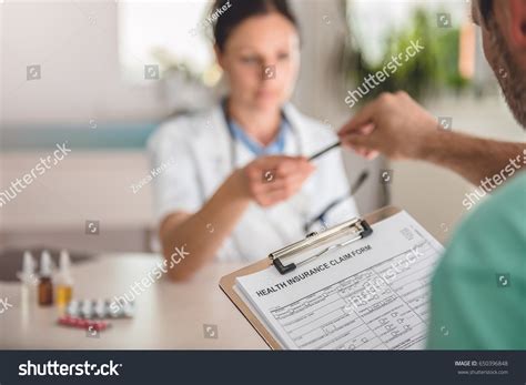 Patient Filing Health Insurance Claim Form Stock Photo 650396848