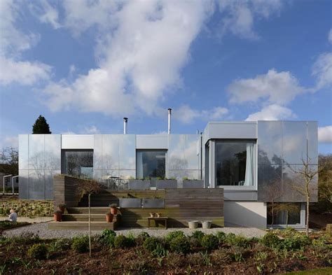 Zero Carbon House With Sliding Reflective Exterior Panels