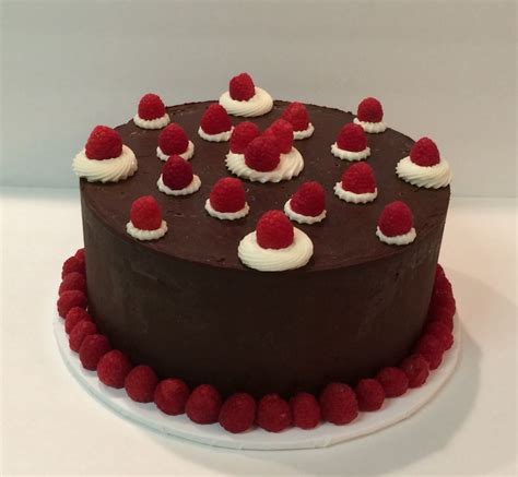 Devils Food Cake With Fresh Raspberry Buttercream Covered In Dark Chocolate Ganache By Jillees