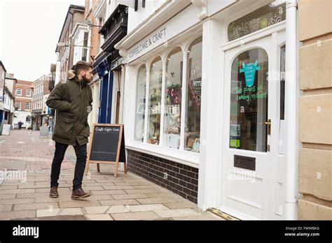 Man Walking To Coffee Shop Stock Photo Alamy