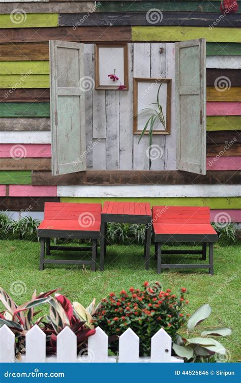 Wooden Table and Chairs in Garden Stock Photo - Image of wooden, colorful: 44525846