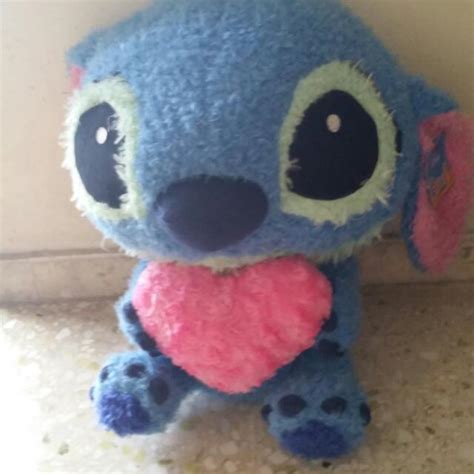 Stitch HOLDING Heart, Hobbies & Toys, Toys & Games on Carousell