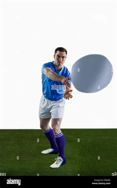 Rugby player about to throw a rugby ball Stock Photo - Alamy