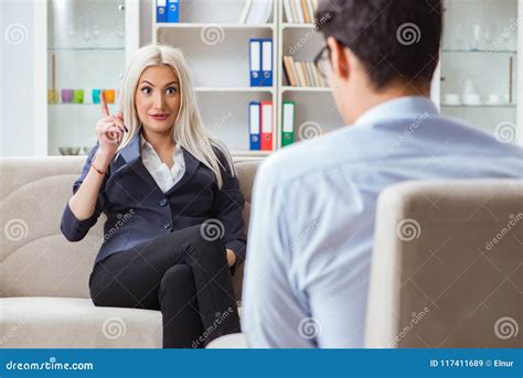 The Young Woman Visiting Psychiatrist Man Doctor For Consultation Stock