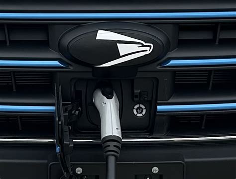 Charged EVs | US Postal Service unveils its first electric delivery ...