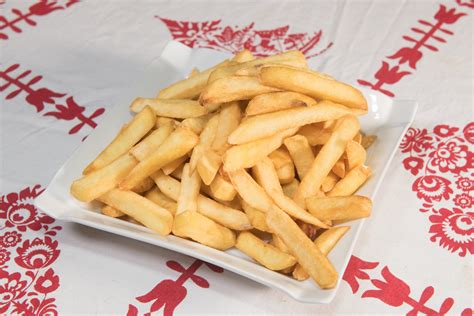 PORCIÓN DE PAPAS FRITAS INDIVIDUAL Trujillo Chicken