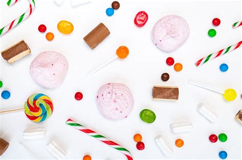 Premium Photo Many Different Sweets On A White Background