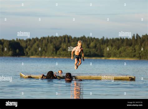 Children swimming in lake Stock Photo - Alamy