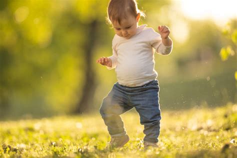 Baby Walking First Time Stock Photos Pictures And Royalty Free Images