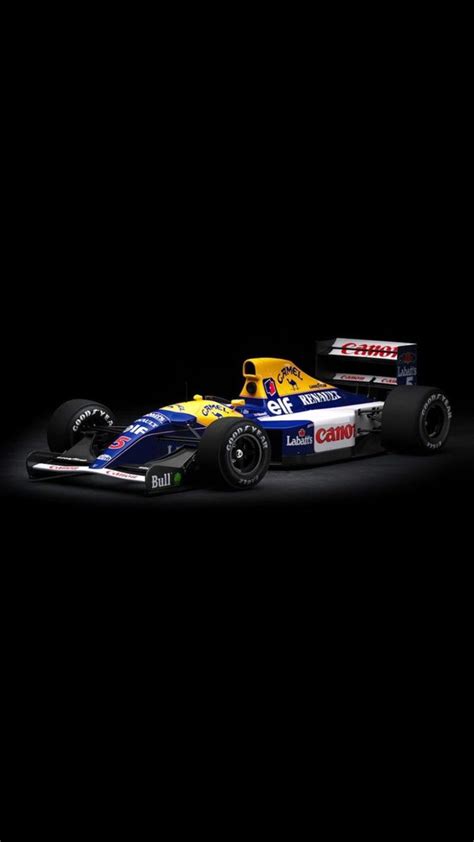 Blue And Yellow Race Car On Black Background