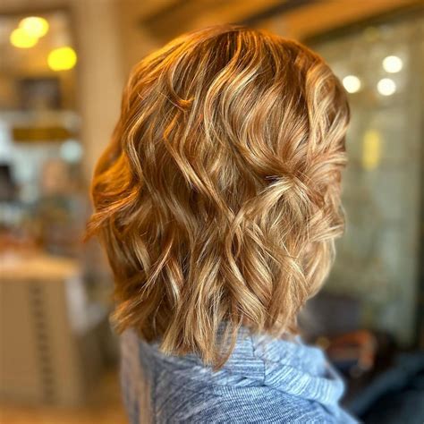 Blonde With Strawberry Blonde Lowlights Offers A Perfect Summer Look